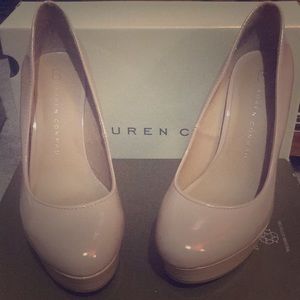 Tan patent leather pumps